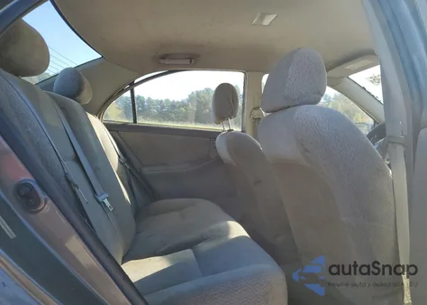 2004 Toyota Corolla Ce z USA, uszkodzony, nr VIN 2T1BR38E94C189727